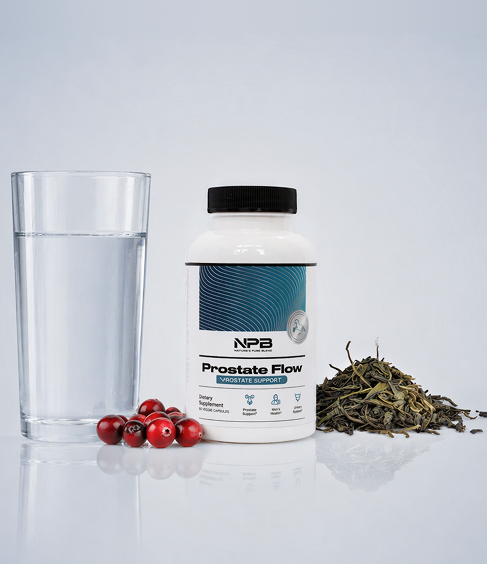 A glass of water, the Prostate Flow bottle, and cranberries